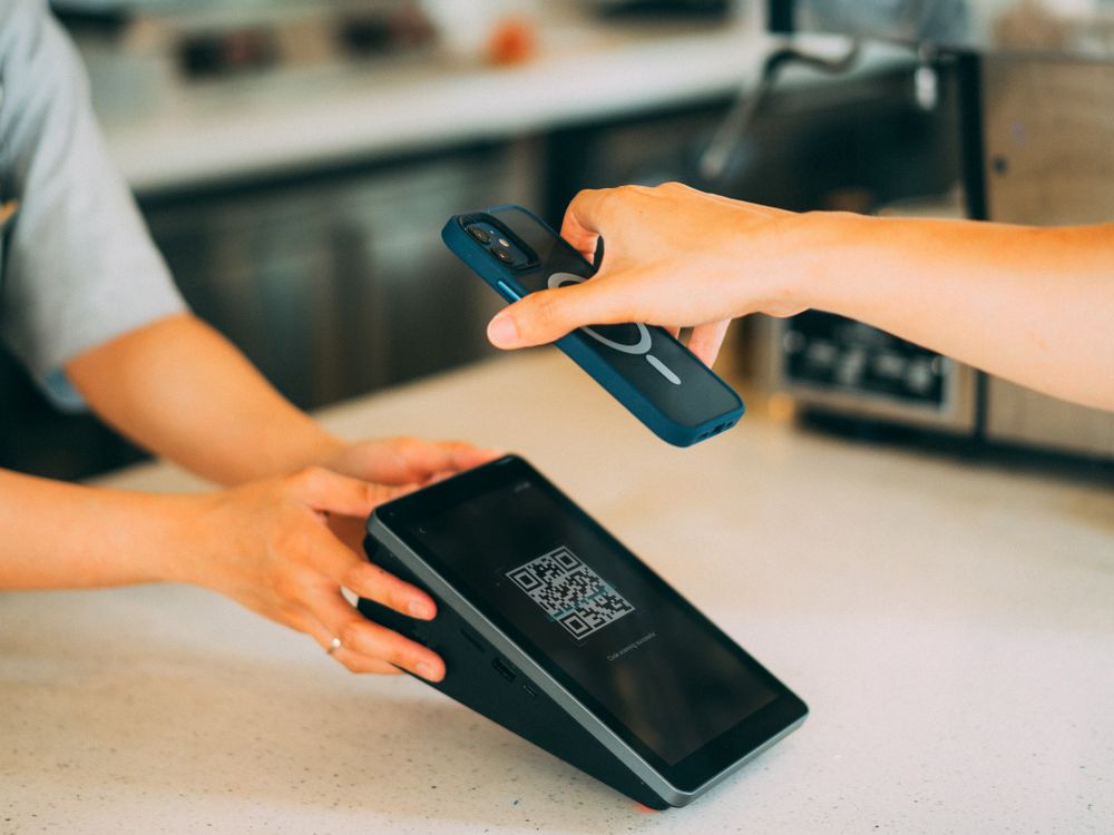 Paiement mobile par QR code sur un terminal marchand